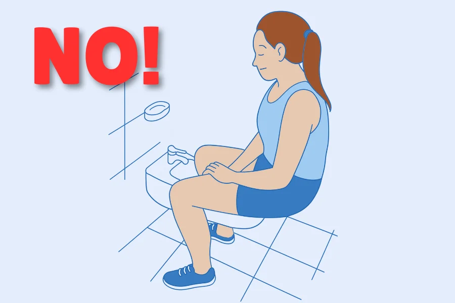 Paziente che utilizza postura corretta e ausili per andare in bagno in sicurezza dopo intervento alla colonna vertebrale
