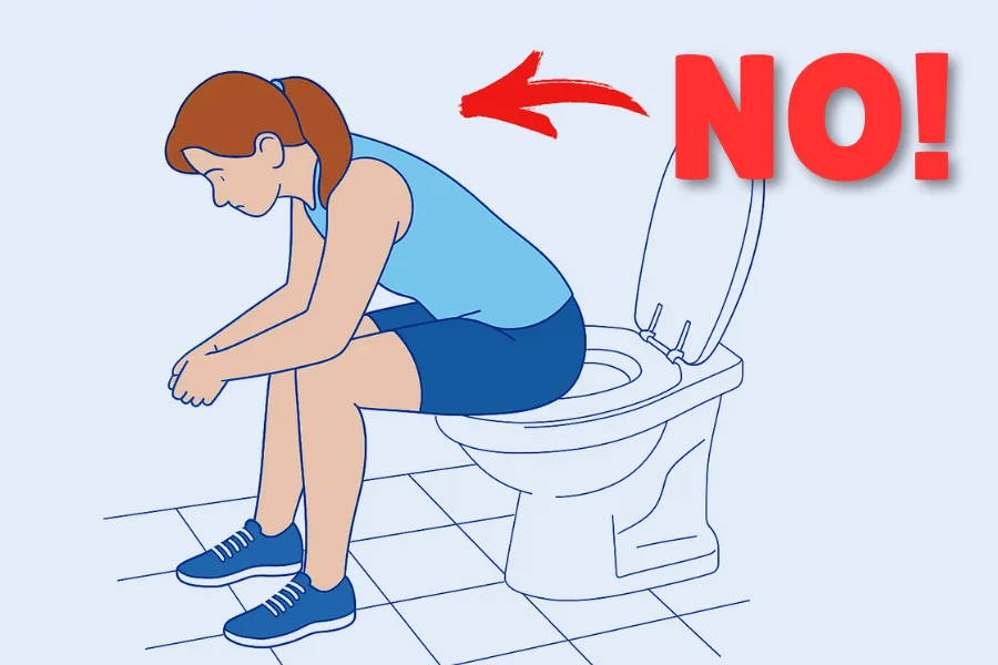 Paziente che utilizza postura corretta e ausili per andare in bagno in sicurezza dopo intervento alla colonna vertebrale